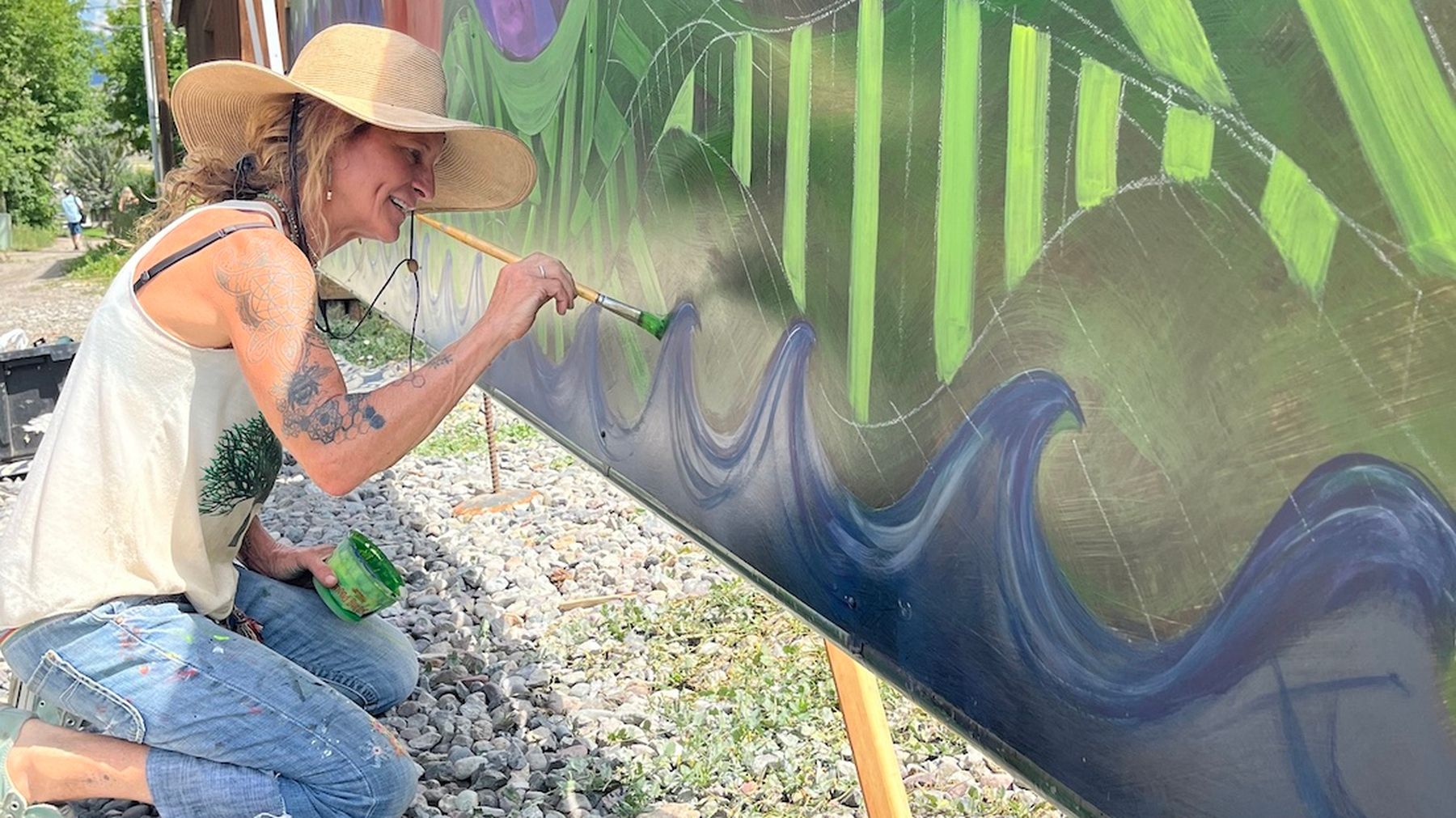 Image of a woman painting